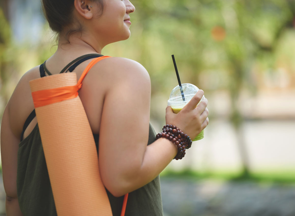 woman drinking juice - always hungry reasons