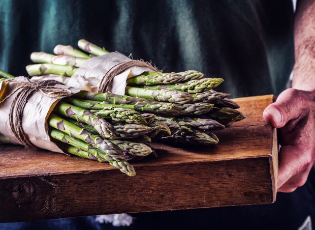 Asparagus on wooden board