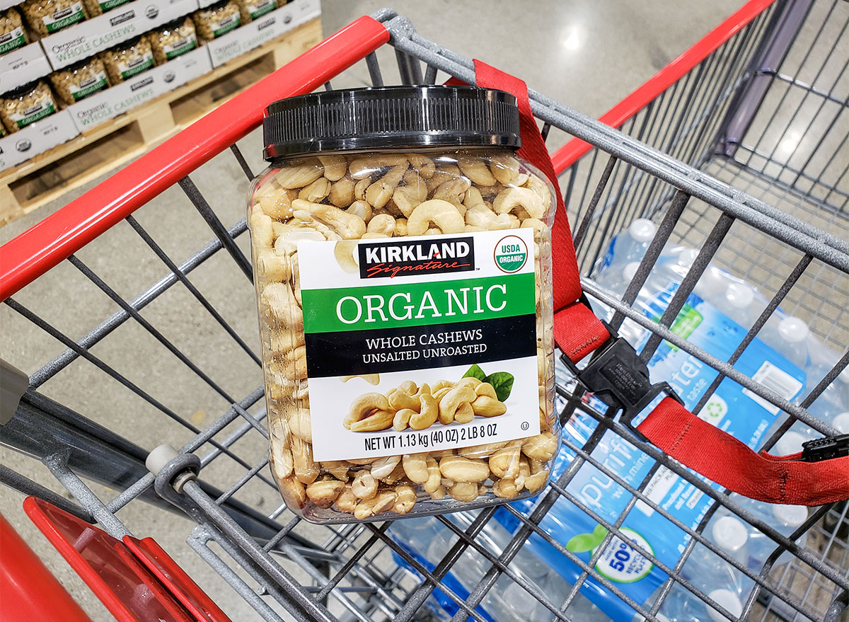 container of costco cashews in shopping cart