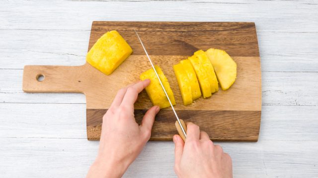Cut pineapple into chunks