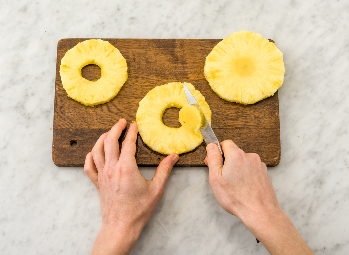 Cut pineapple into rings