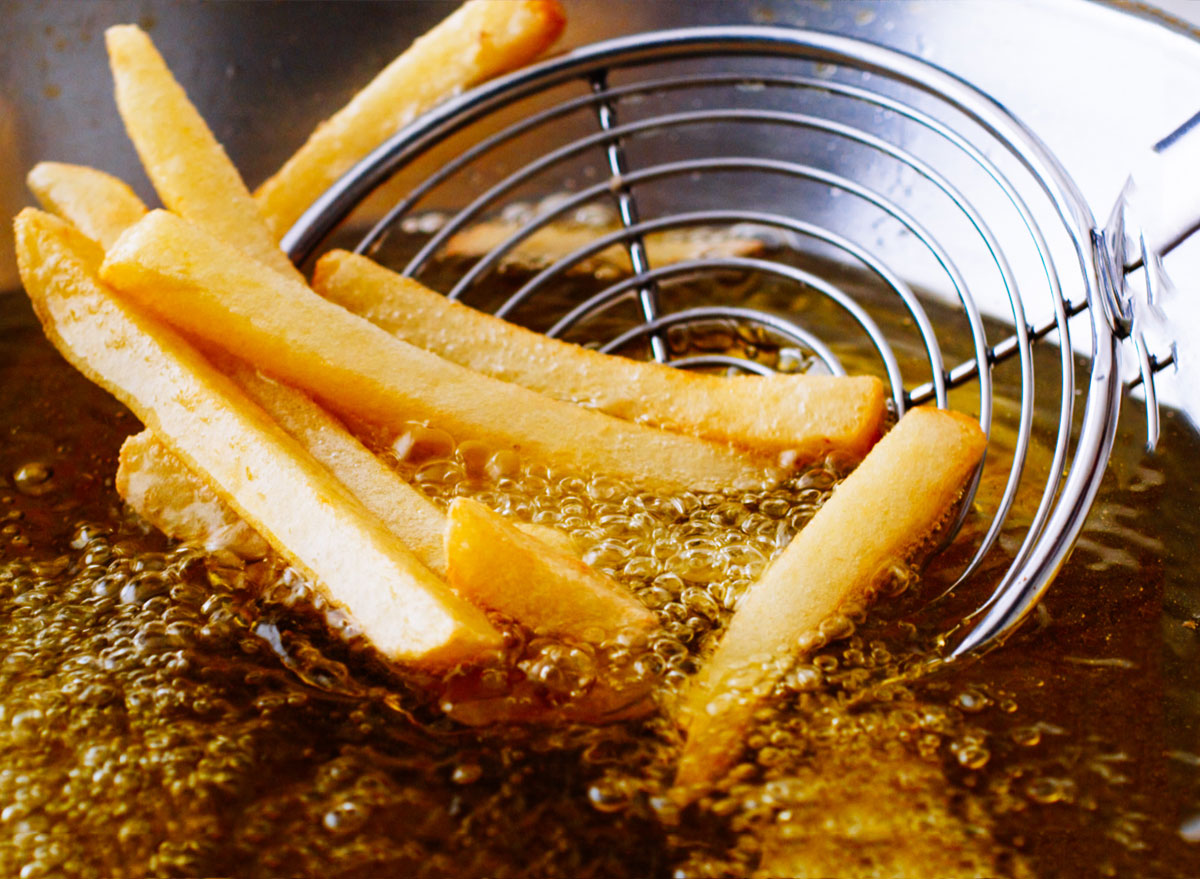 Deep fry french fries in oil