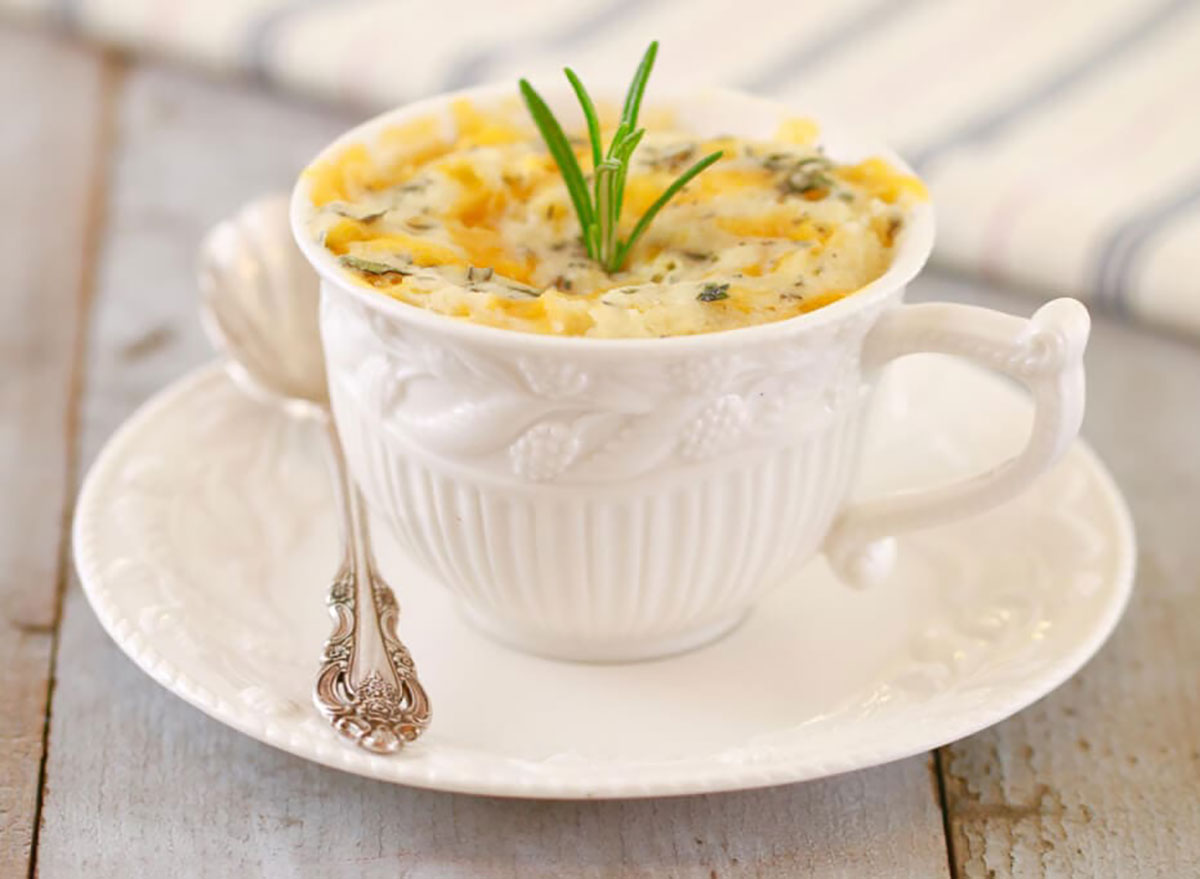 microwave cheddar herb biscuit in white teacup