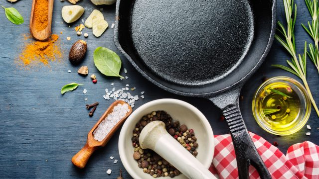 Cast iron skillet with herbs and spices