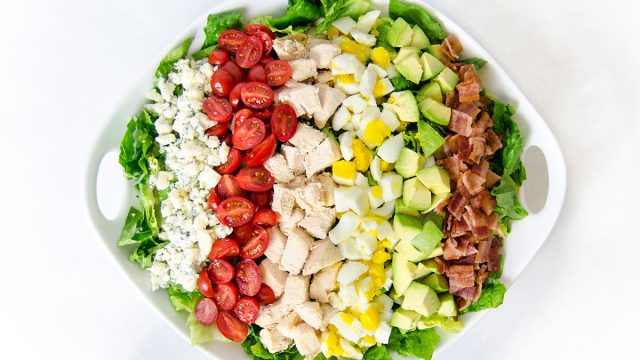 Cobb salad against white background