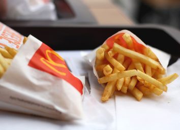 Two mcdonalds fries bags