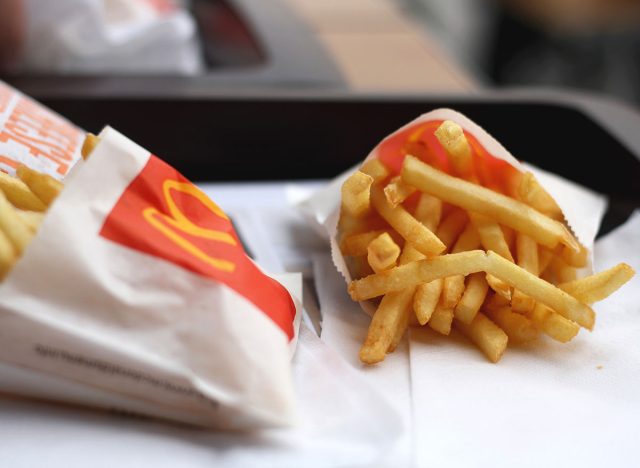 Two mcdonalds fries bags