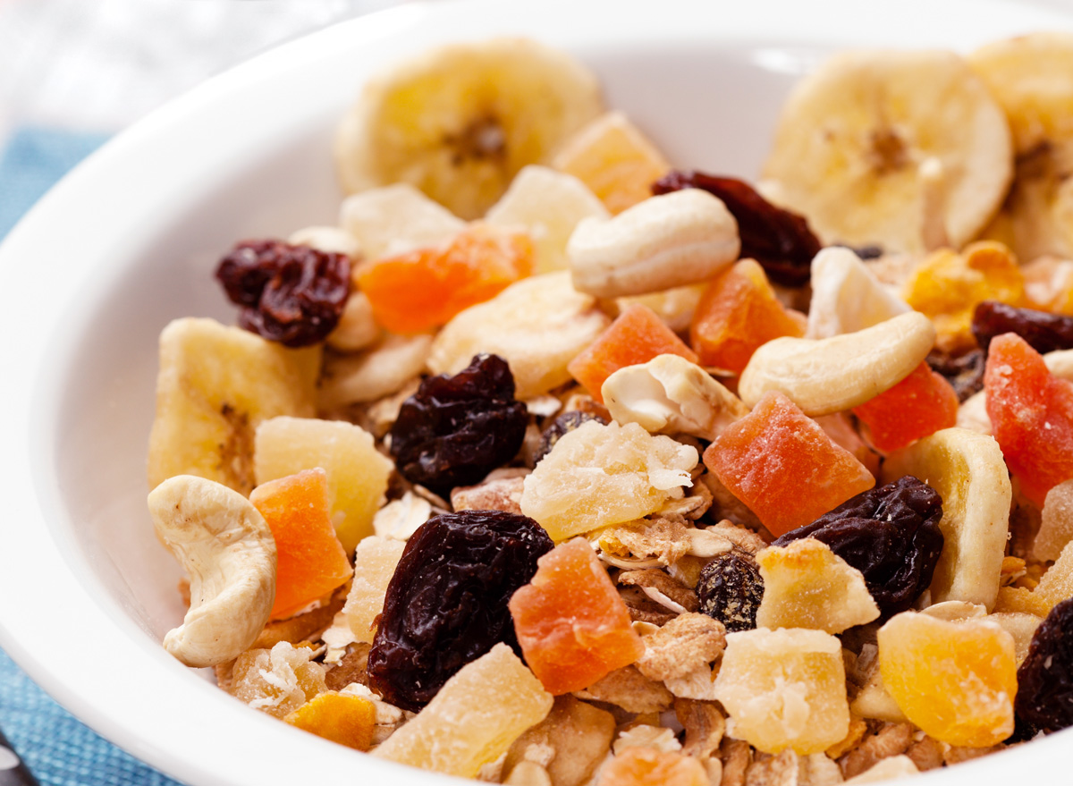 Dried fruit and nuts on top of oat oatmeal breakfast