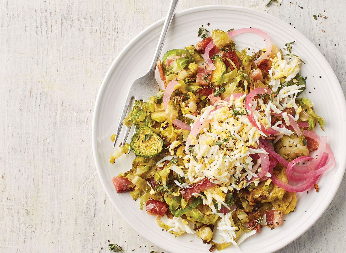 Warm brussel sprouts salad with eggs and pickled red onions