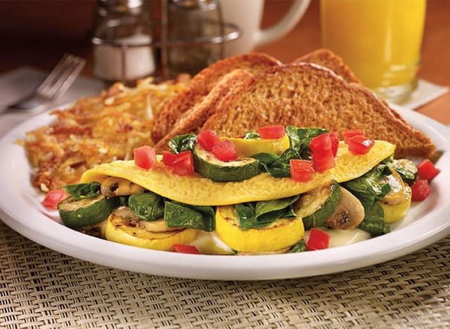 Loaded veggie omelette with hash browns