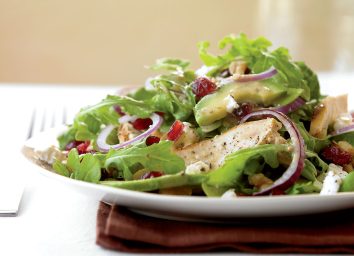 Grilled chicken salad with cranberries avocado and goat cheese