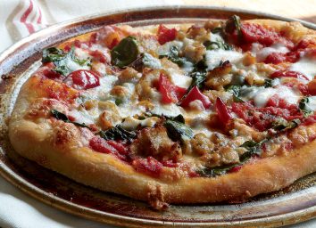 Healthy spinach sausage pepper pizza