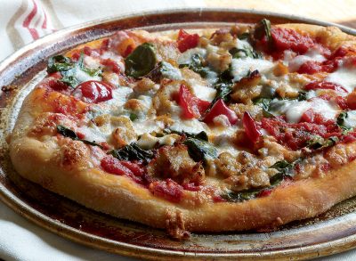 Healthy spinach sausage pepper pizza