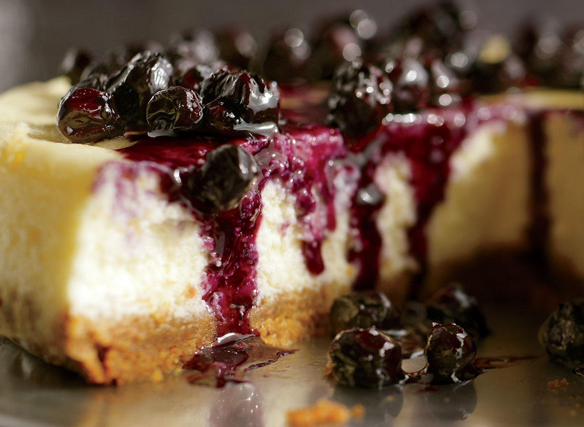 Low-calorie ricotta cheesecake with warm blueberries