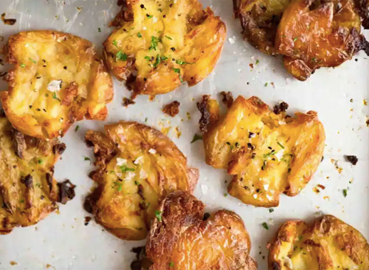 crispy smashed potato pieces on baking sheet