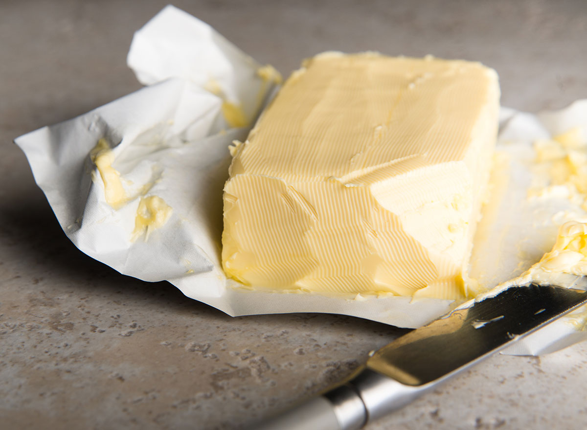Softened butter with knife