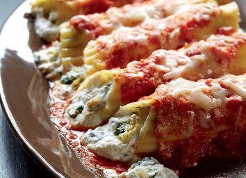 Spinach-artichoke tomato sauce manicotti with spicy