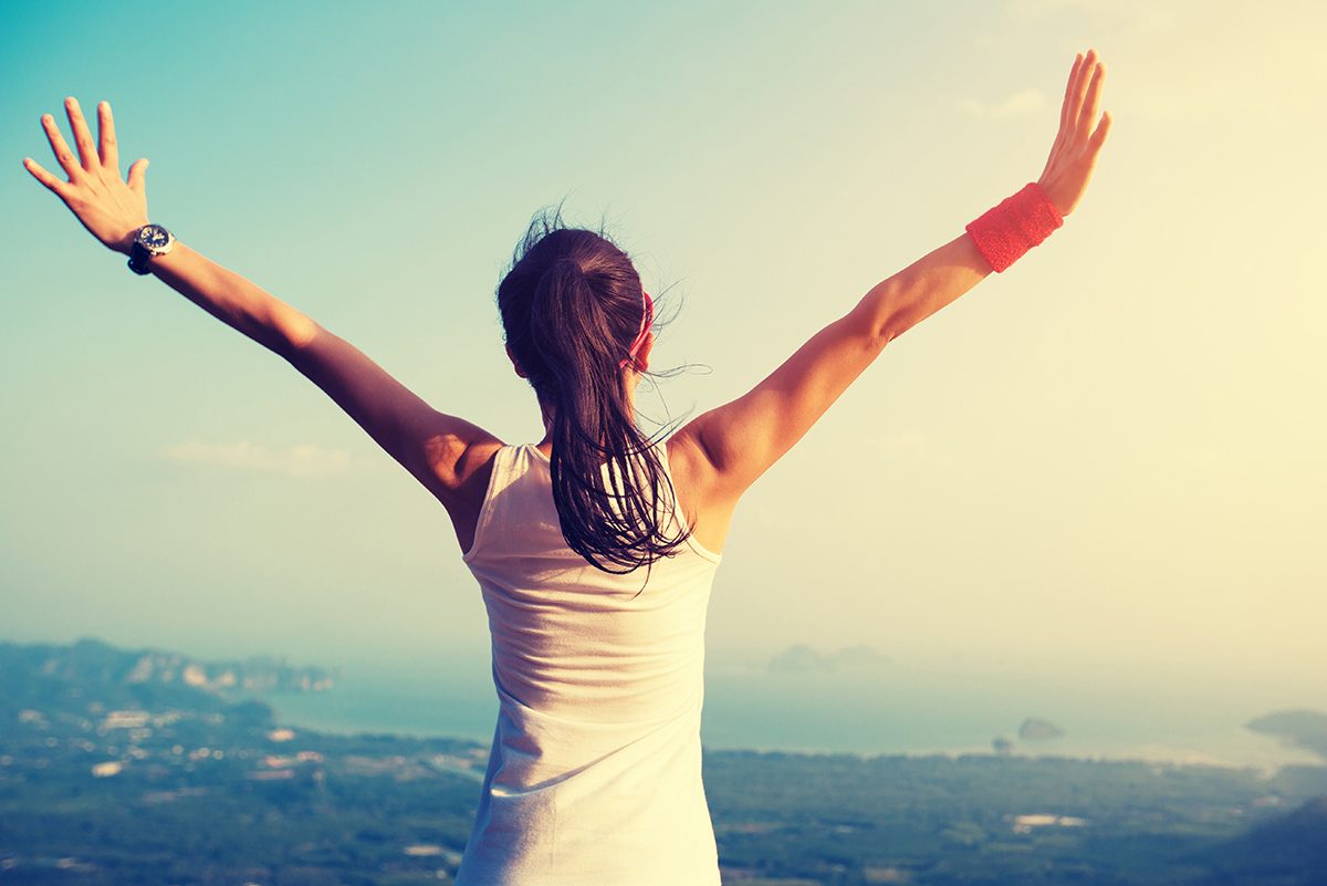 woman-looking-at-landscape-in-workout-gear