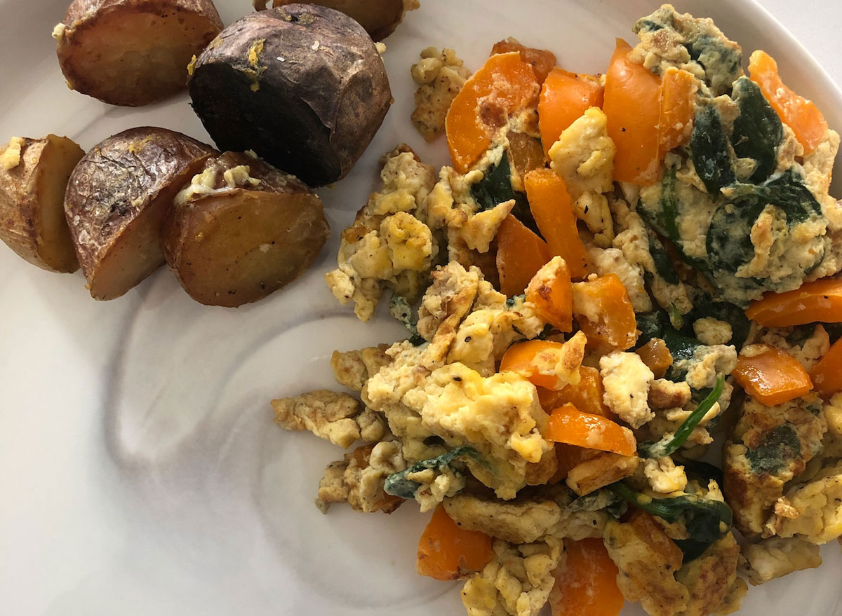 Egg scramble with spinach potatoes and orange peppers by keri glassman