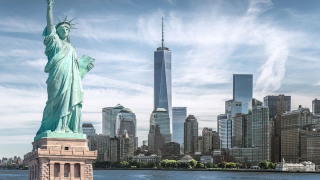 New york city skyline with statue of liberty and one world trade center