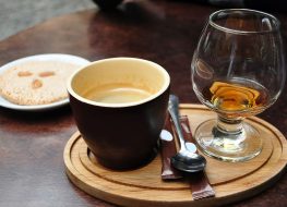 caffeinated alcohol in separate glasses on tray
