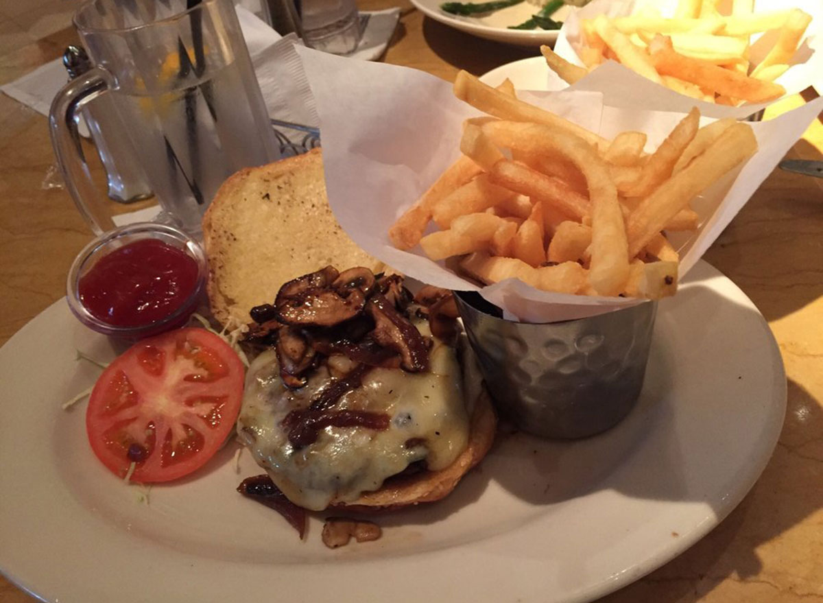 cheesecake factory mushroom burger meal on plate