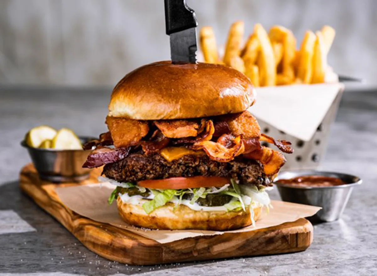 chilis southern smokehouse beef burger with knife in top