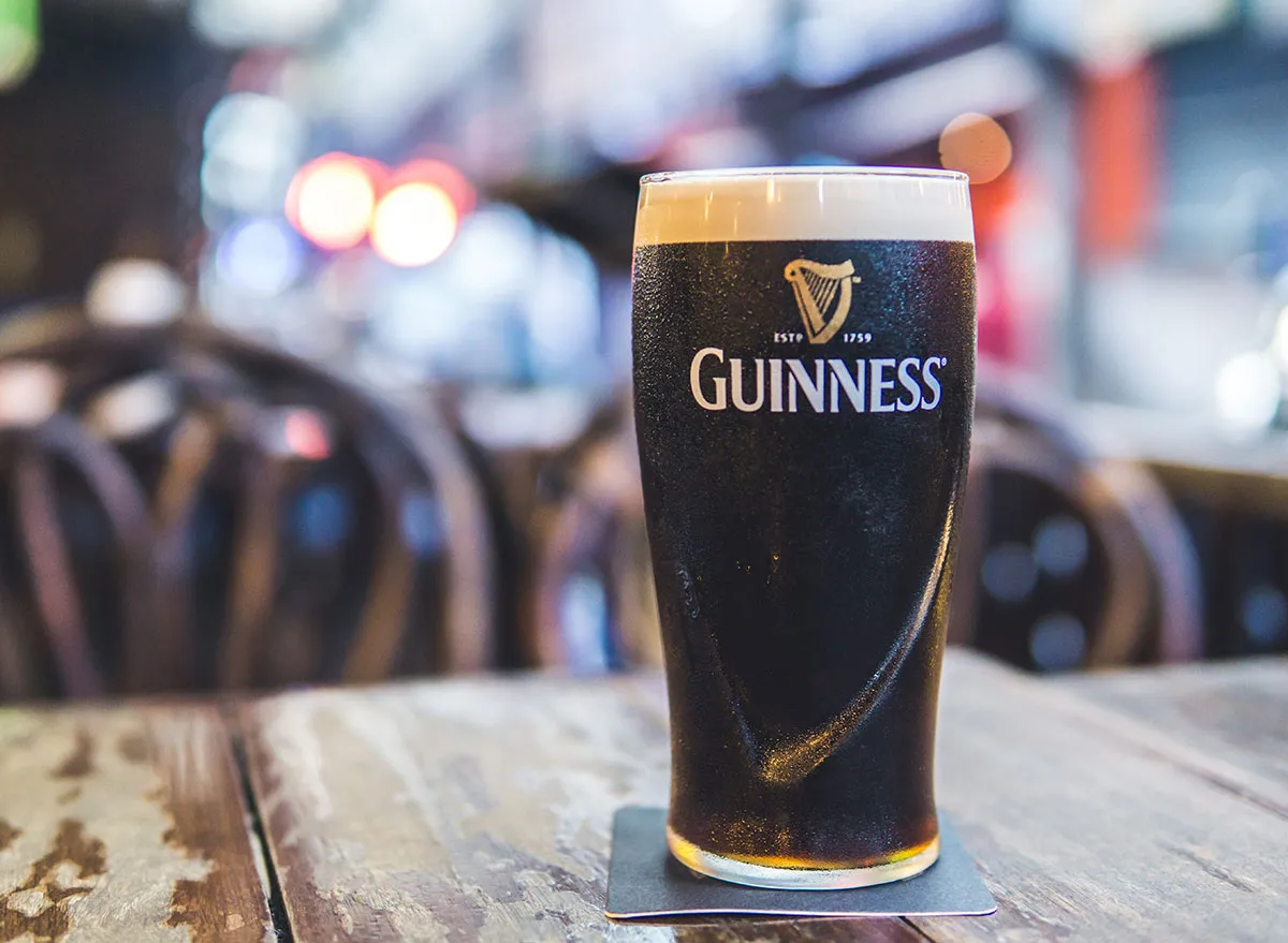 dark colored guinness in glass closeup