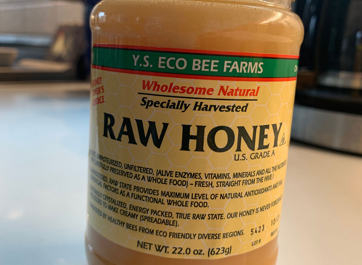 wholesome natural specially harvested raw honey jar