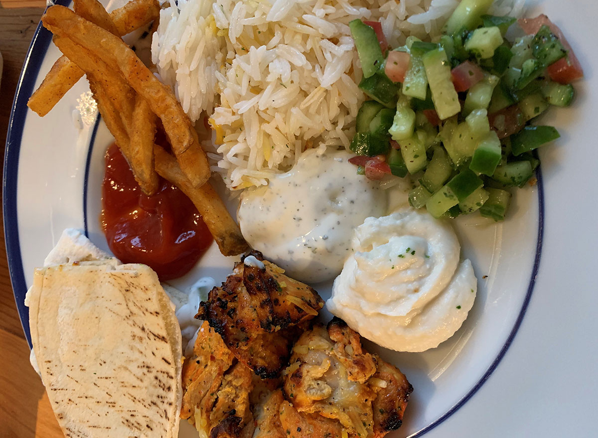 grilled chicken rose garlic dip shirazi salad persian cucumbers tomato basmati rice pita bread tzatziki french fries