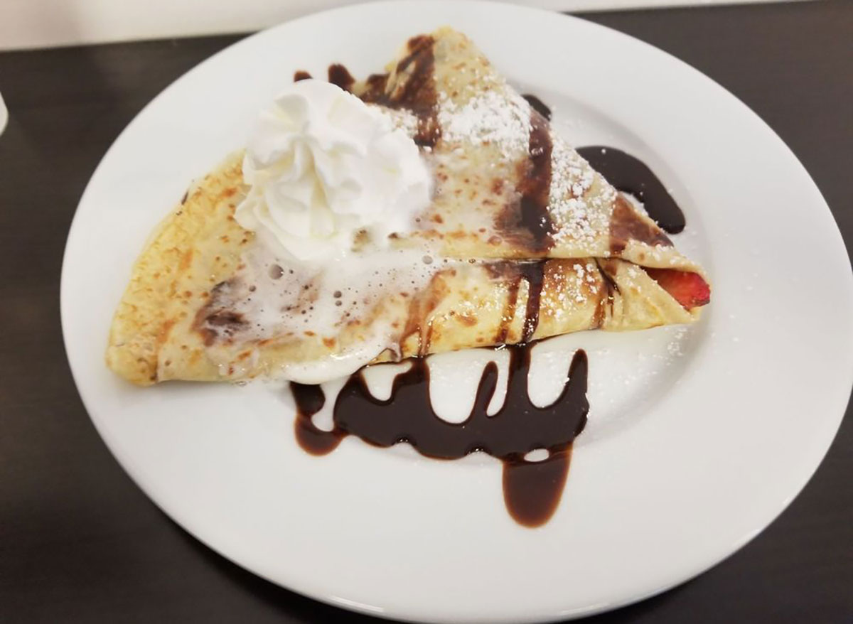 lamias crepes strawberry crepe with chocolate syrup and whipped cream