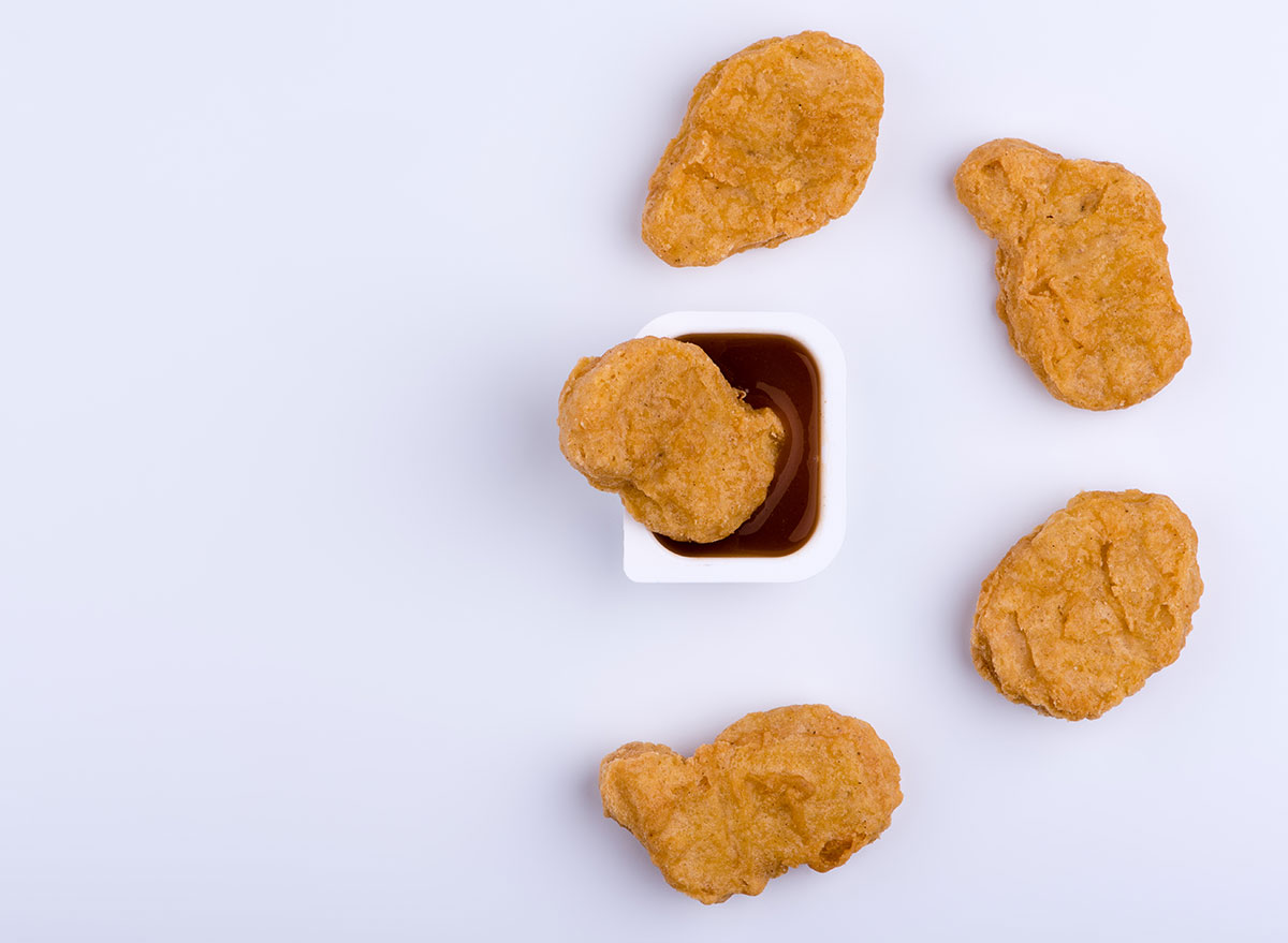 red dipping sauce with nuggets