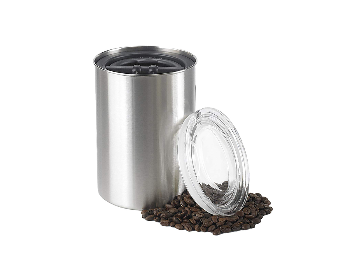 coffee beans stored in an opaque airtight container