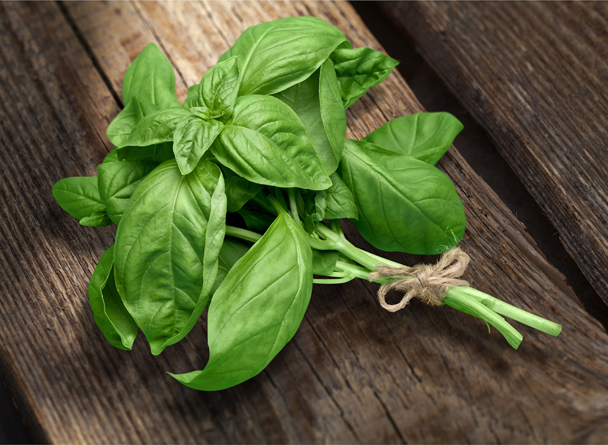 bundle of basil on wood