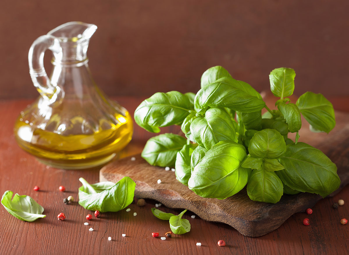 basil with olive oil on serving platter