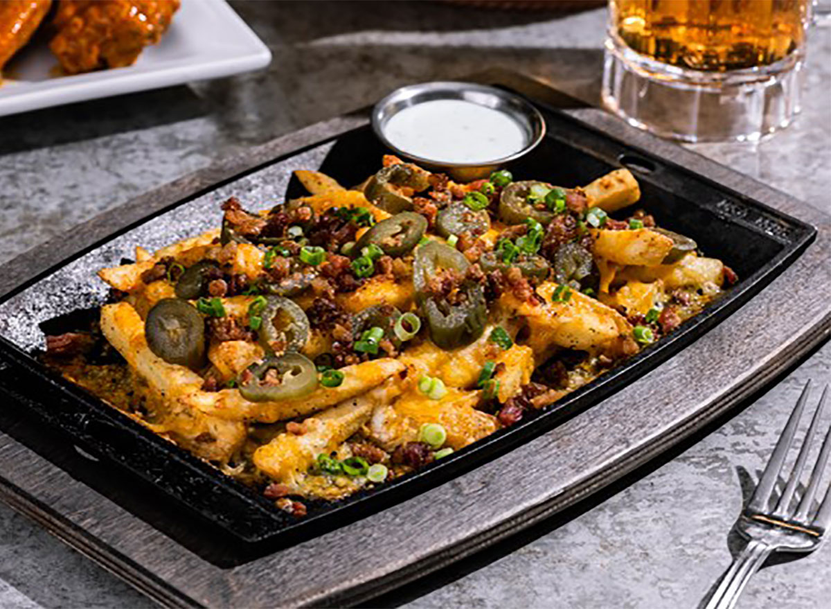 plate of texas cheese fries from chilis