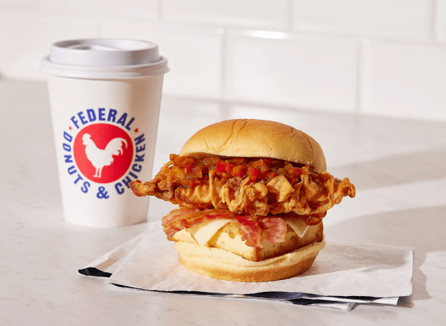 a chicken sandwich from federal donuts with a coffee.