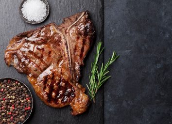 grilled T bone steak with peppercorn, sea salt, and rosemary