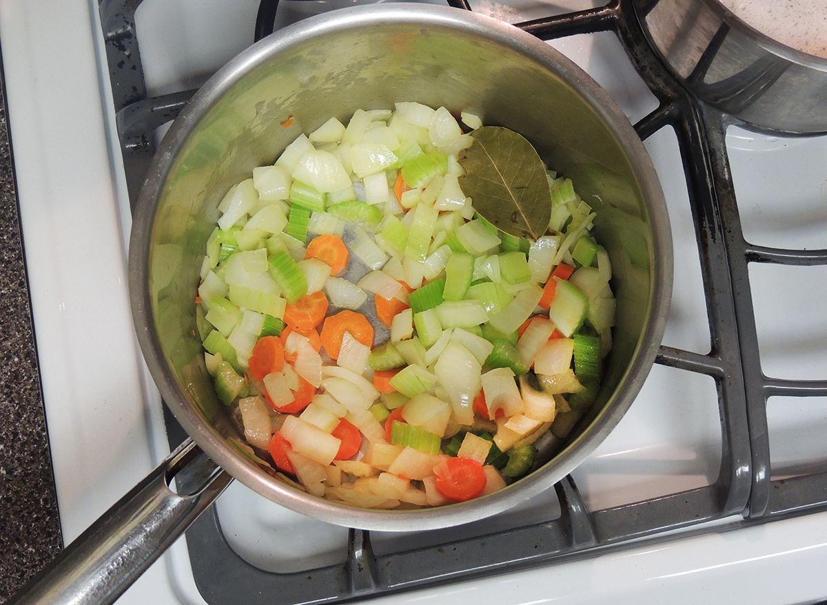 pan full of diced celery onion and carrot (mirepoix)