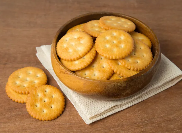 ritz crackers in bowl on cloth napkin