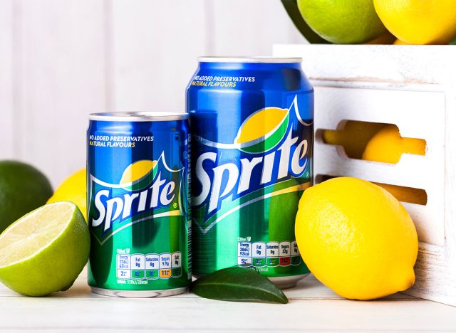 cans of sprite with sliced lemons and limes
