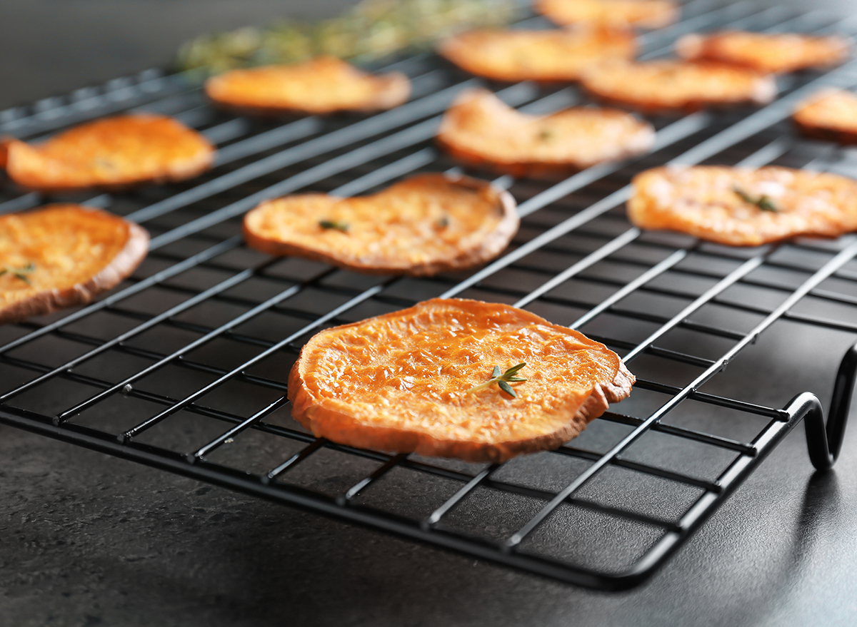 sweet potato chips drying on a cooling rack