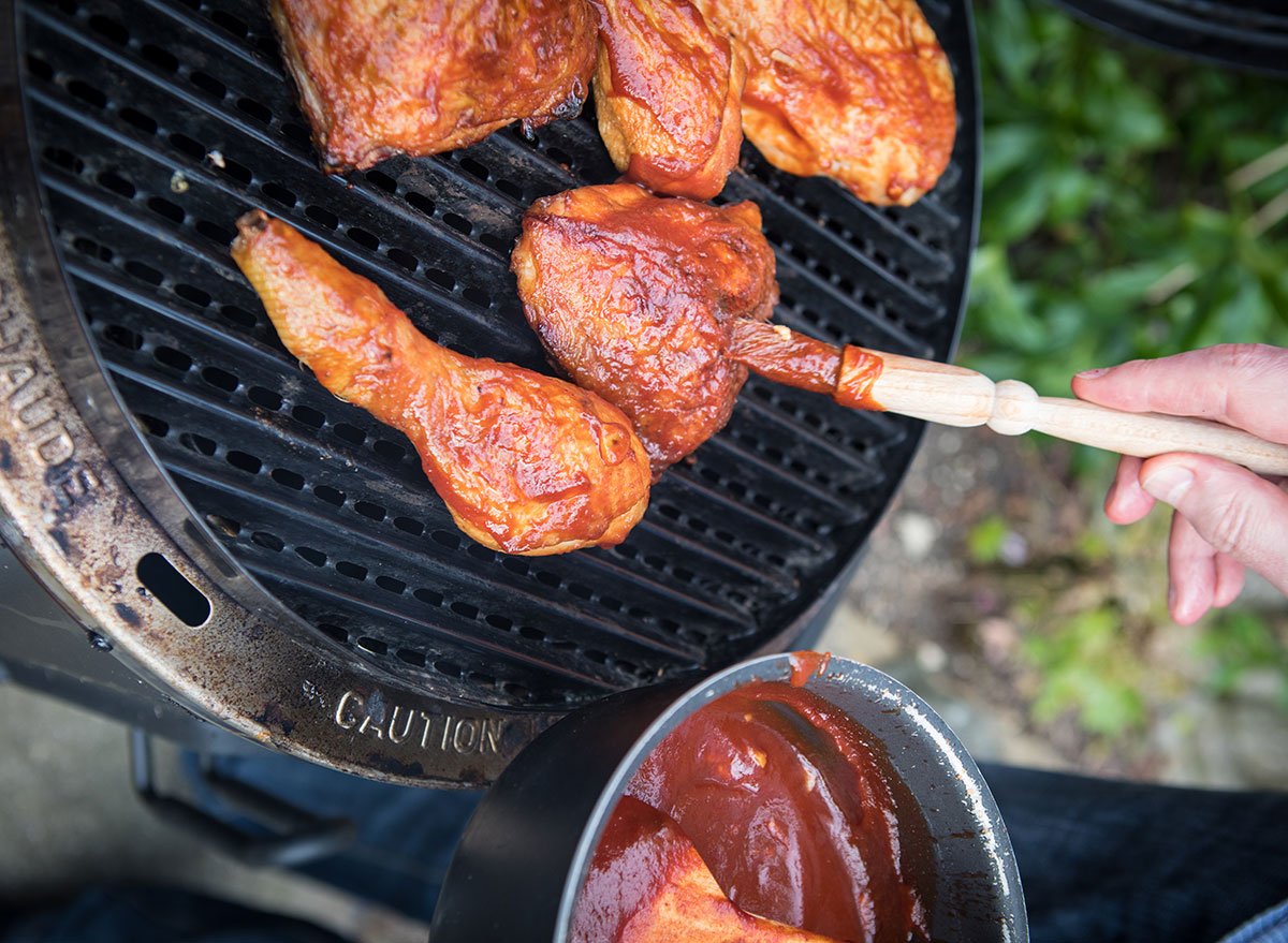 basting meat on grill