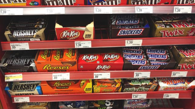Checkout aisle at grocery store candy bars