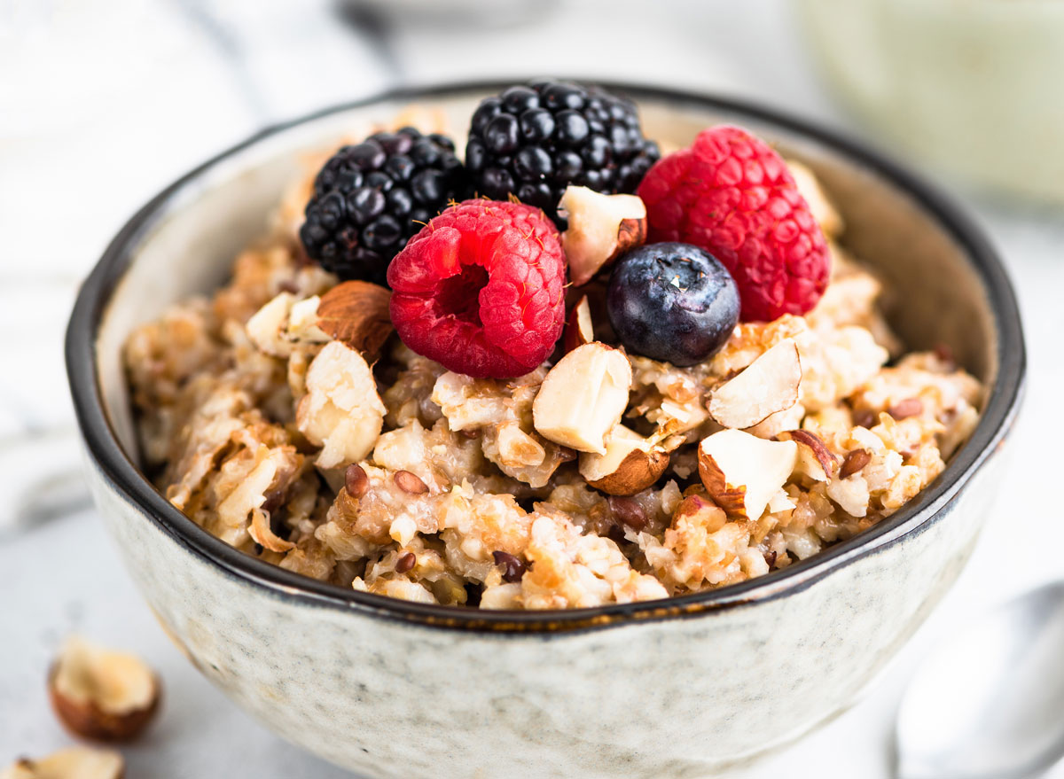 High fiber breakfast whole grain oatmeal with fresh berries nuts and seeds - PCOS diet