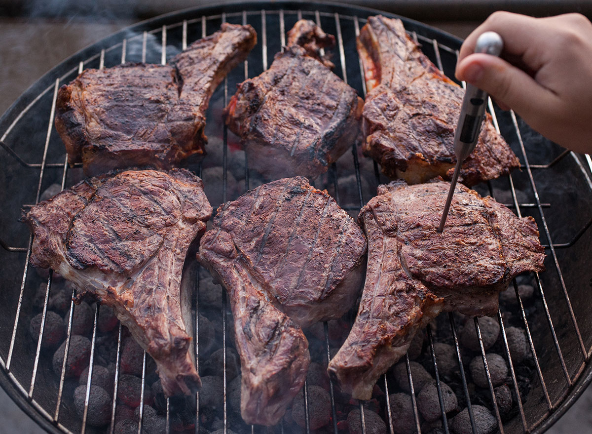 testing meat temperature on grill