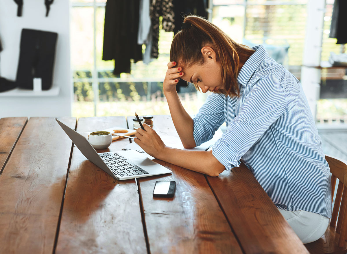 Woman is stressed tired and cant focus on her work