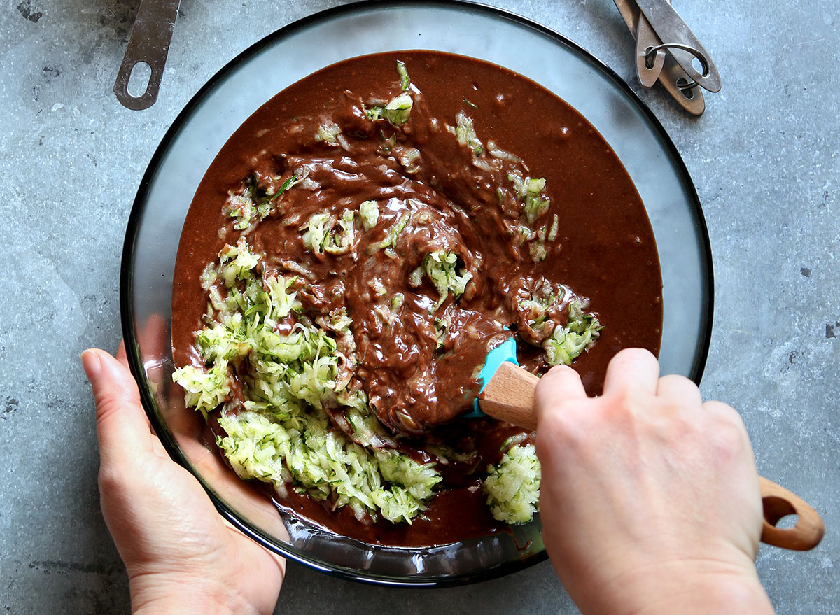zucchini mixed into chocolate cake batter