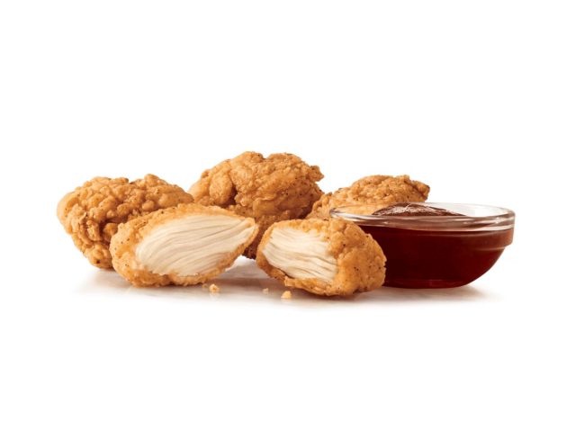 Arby's 4-piece nuggets with sauce on a white background