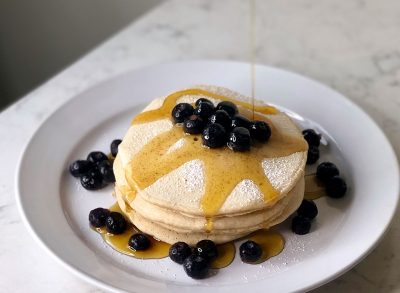 banana pancake with cottage cheese blueberries and syrup